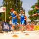 Sportler laufen in Rennen